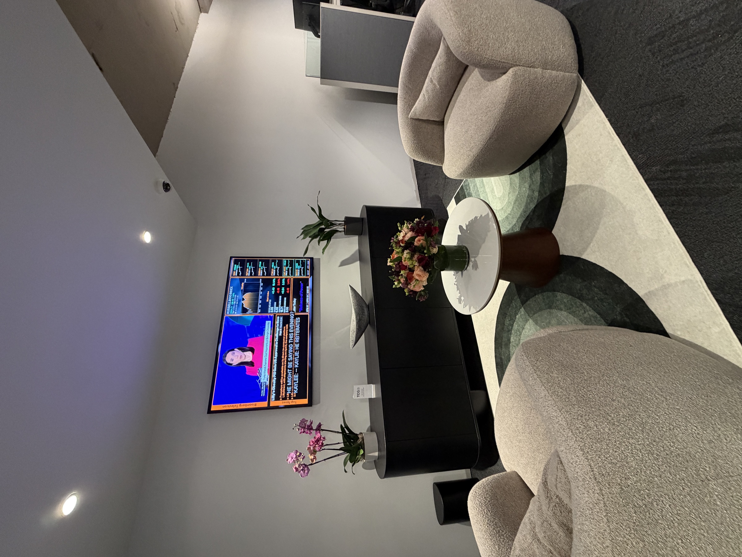 A Samsung Frame TV installed in the finished TCG reception lounge